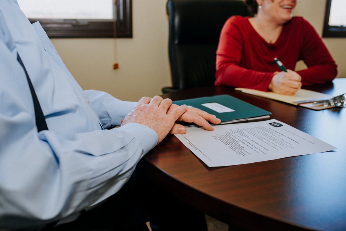 accountant discussing tax resolution options