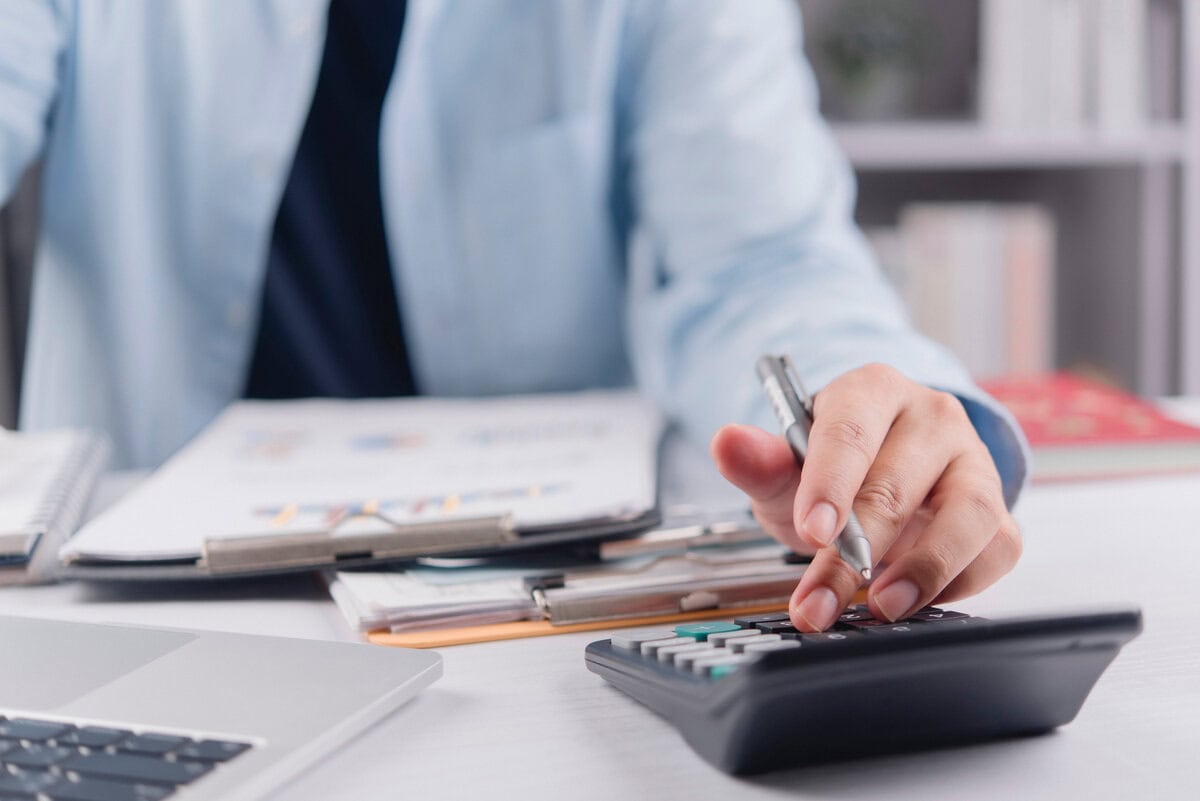 accountant reviewing financials and preparing tax filings